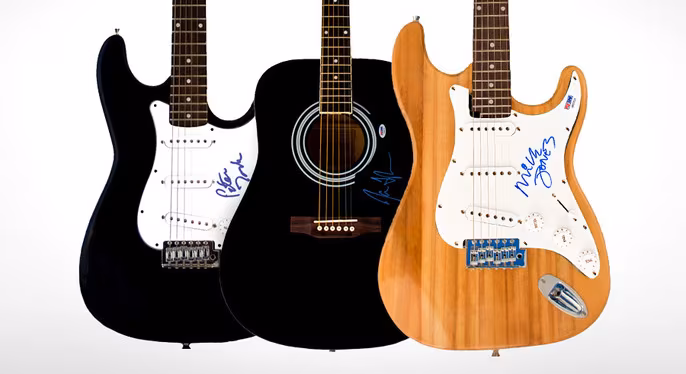 New Dimensions: Autographed Guitars & More at Gilt